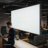 Modern coworking space with people working on laptops