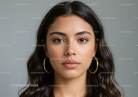 Elegant Woman with Brown Eyes and Long Dark Hair in Close-Up Portrait