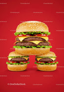 Triple cheeseburgers with fresh lettuce and tomato