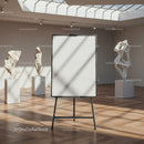 Blank canvas easel in modern art gallery interior