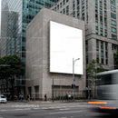 Urban Street Scene with Large Blank Billboard on Building
