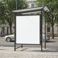 Empty bus stop billboard on urban street sidewalk