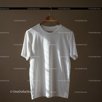 White Cotton T Shirt Hanging on Wooden Hanger