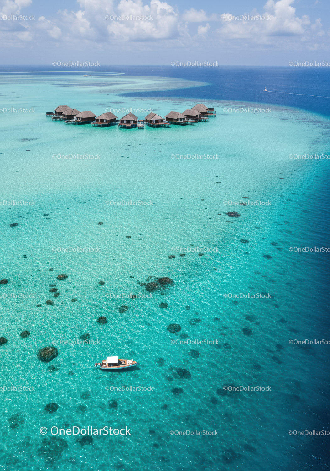Tropical Overwater Bungalows on Bright Turquoise Ocean