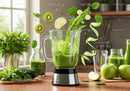 Fresh Green Smoothie Ingredients Splashing in Blender