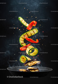 Grilled vegetables tossed in sizzling black pan