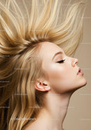 Blonde woman with flowing hair and serene expression