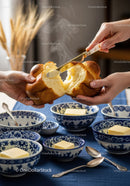 Fresh Bread Bowl with Butter and Steaming Hot Soup for Cozy Breakfast