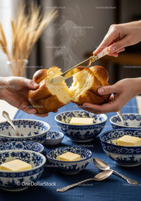 Fresh Bread Bowl with Butter and Steaming Hot Soup for Cozy Breakfast