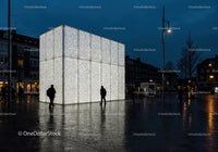 Illuminated Modern Building in Night City Square with Urban Ambiance