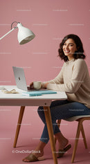 Smiling Woman Using Laptop in Modern Home Office Setup