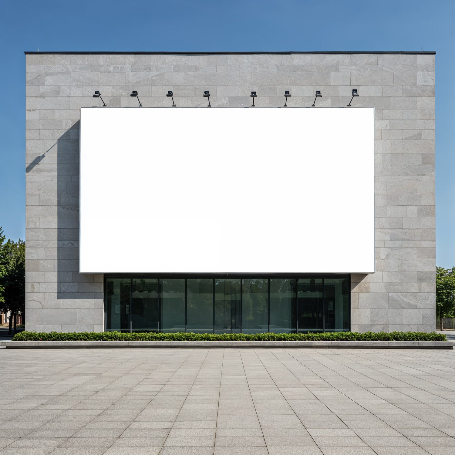 Modern building facade with blank white billboard outdoors