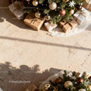 Cozy Christmas decorations with wrapped gifts under tree