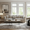 Bright Minimalist Living Room with Large Windows and Cozy Sofa