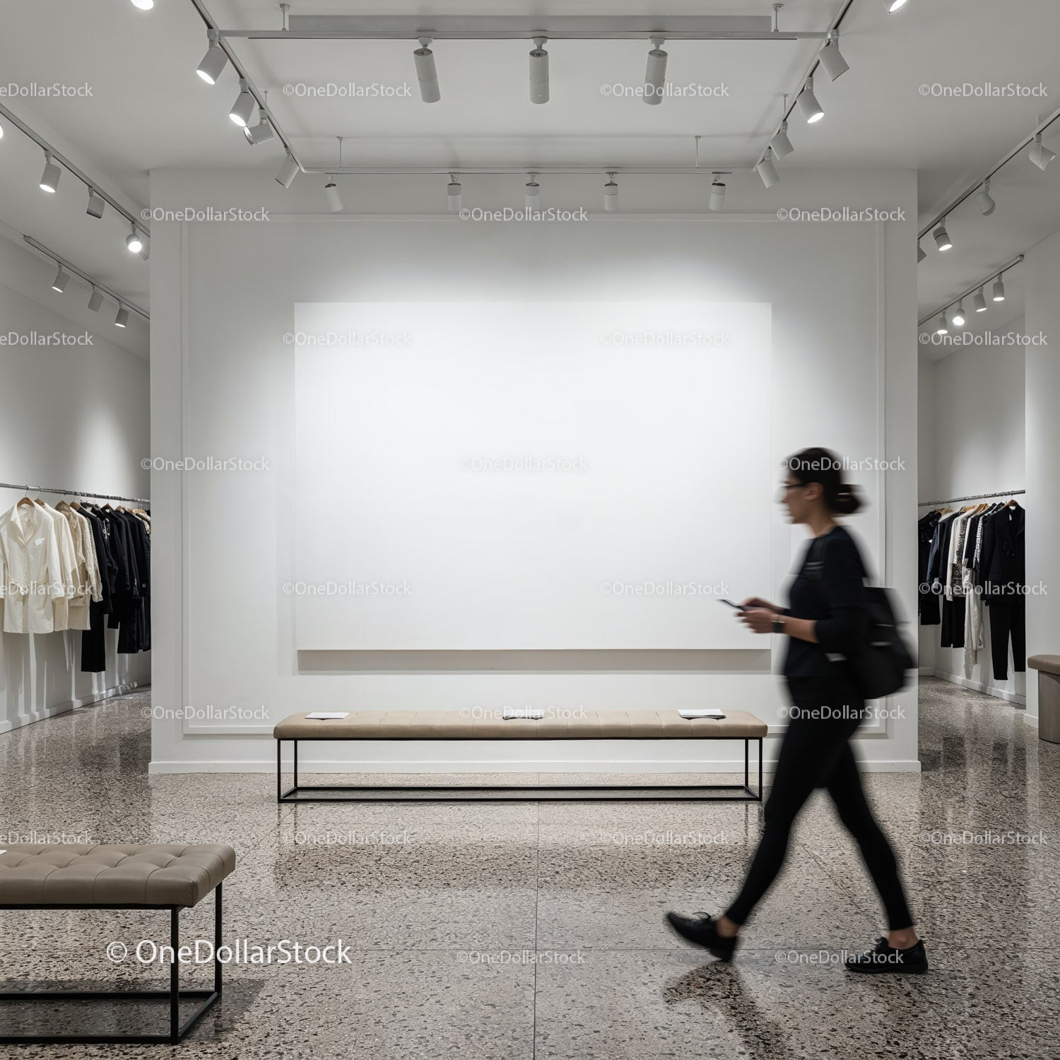 Modern boutique interior with woman walking past display