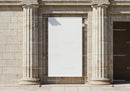 Blank white banner between classical stone columns