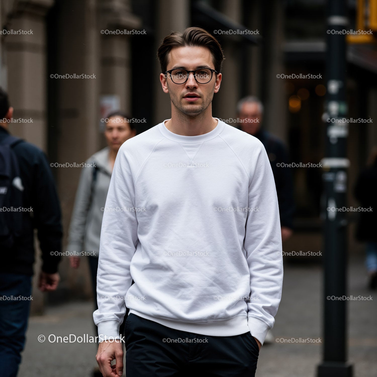 Young man walking confidently in urban street setting