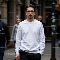 Young man walking confidently in urban street setting