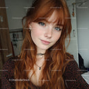 Red Haired Woman with Blue Eyes in Cozy Home Interior