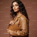 Elegant Woman with Curly Hair Wearing Brown Leather Jacket