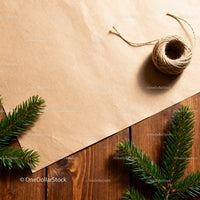 Rustic Christmas Wrapping Setup on Wooden Table