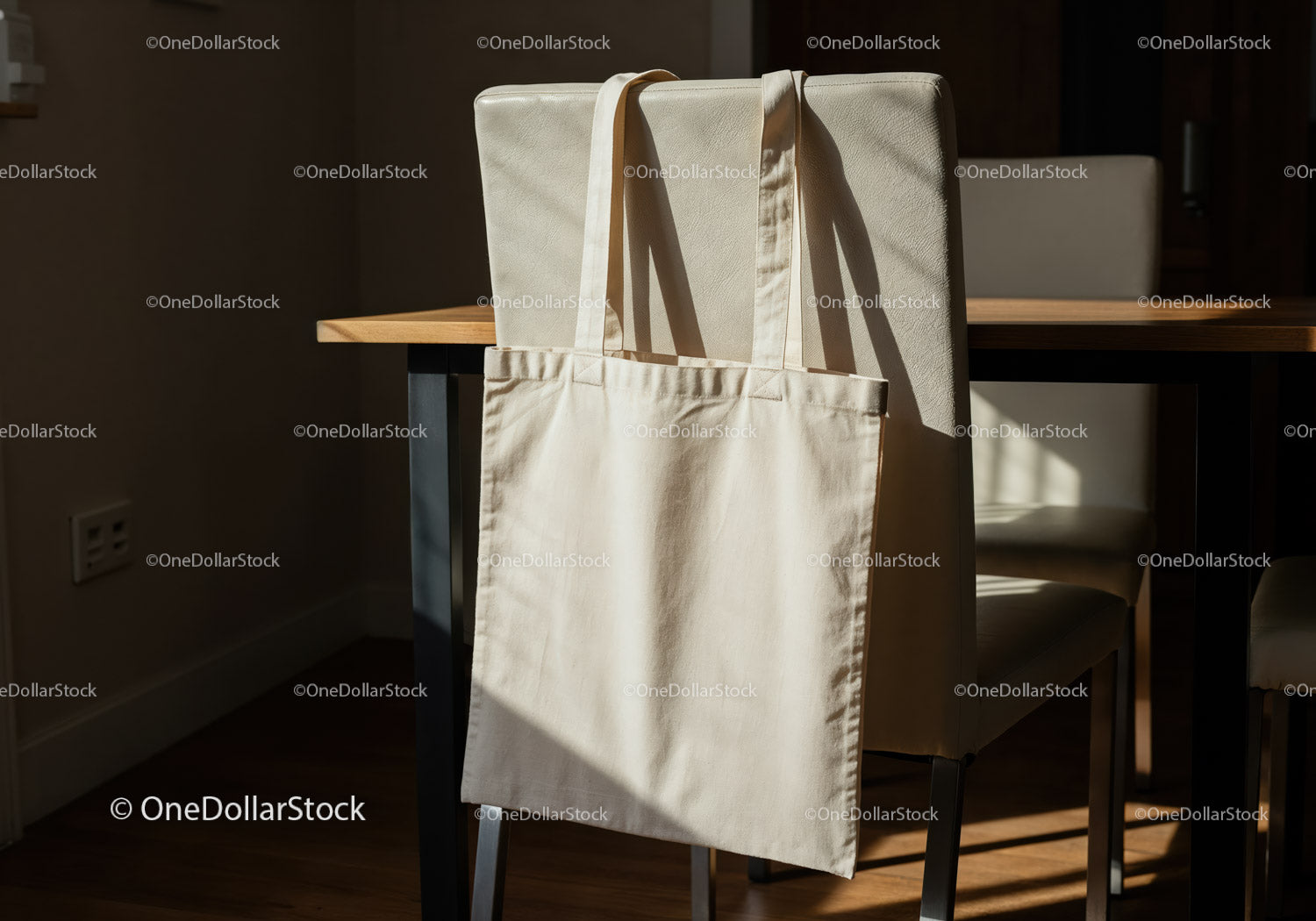 Minimalist canvas tote bag hanging on dining chair