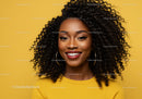 Elegant Black Woman with Curly Hair and Bright Smile Portrait