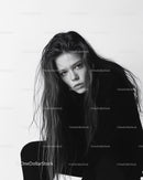 Moody Black and White Portrait of a Woman with Intense Expression