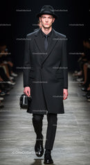 Male model in classic black trench coat and hat