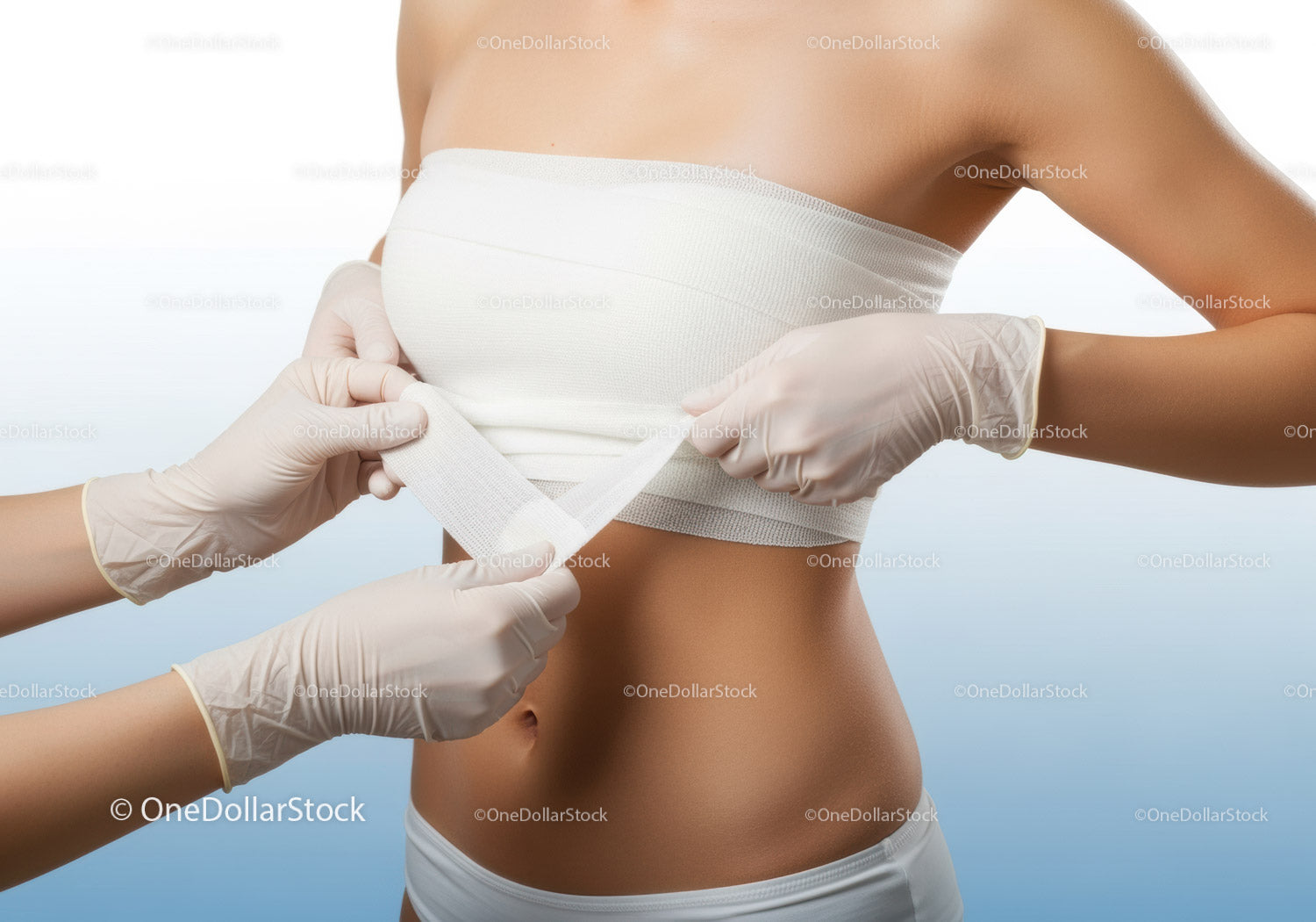 Woman in White Strapless Top Getting Medical Bandage Applied
