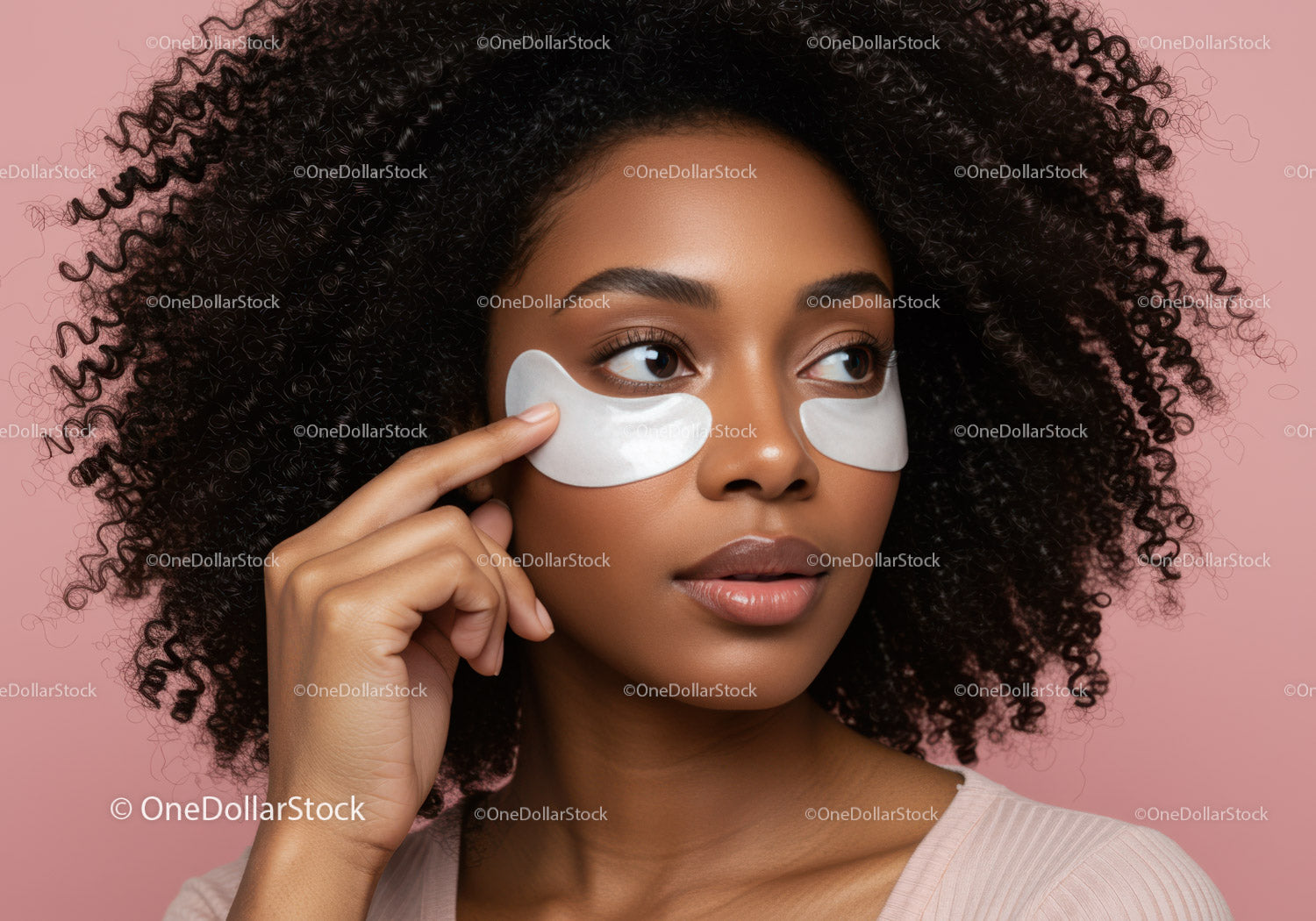 Beautiful woman with facial masks enjoying skincare routine