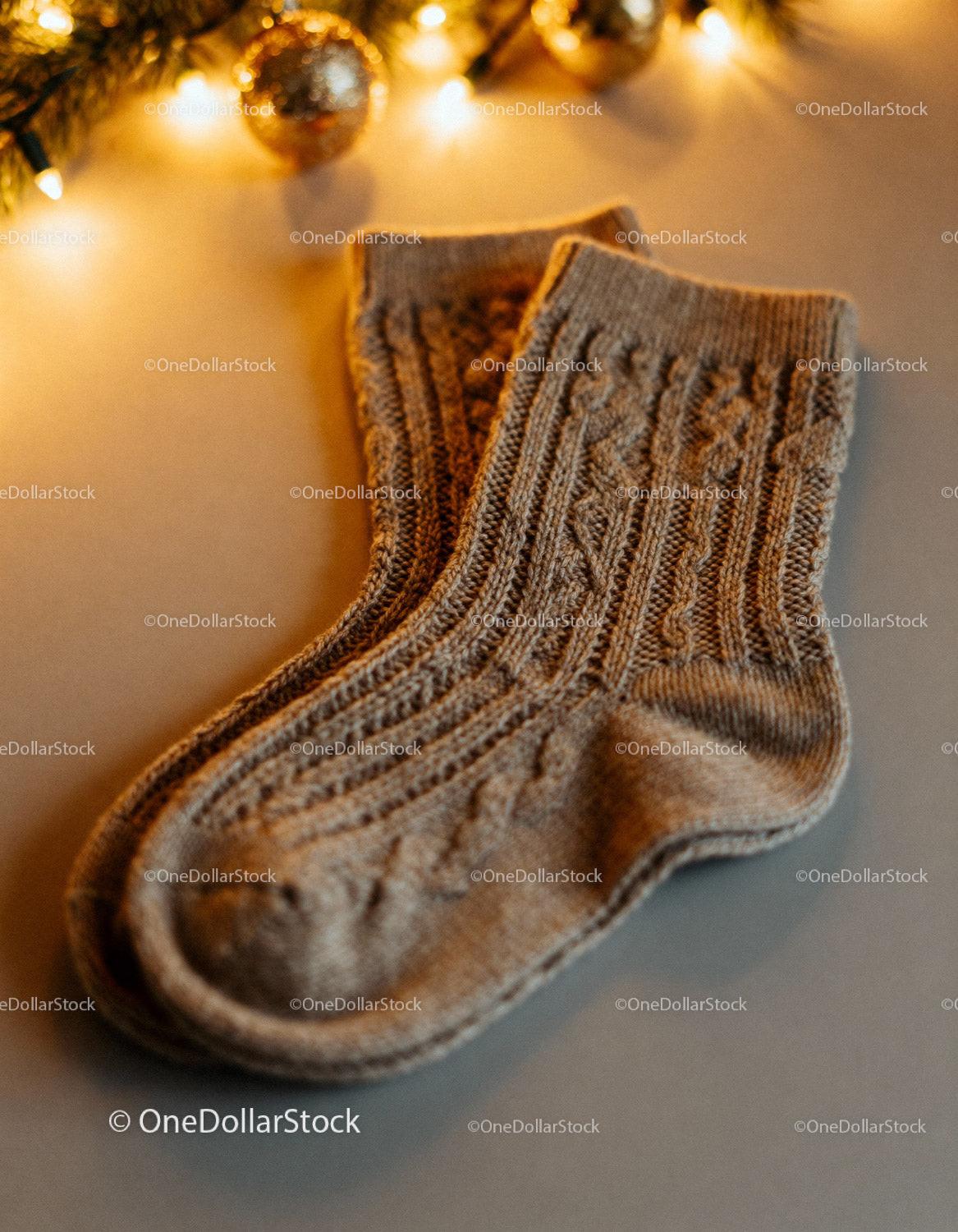 Cozy knit wool socks with festive warm lighting