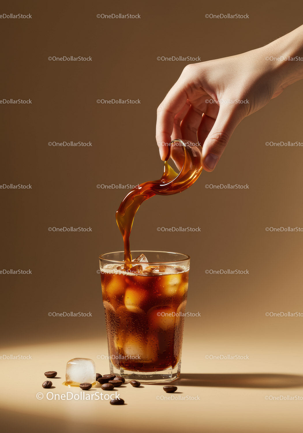 Pouring Cold Brew Coffee Over Ice Cubes in Glass