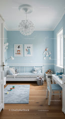 Cute Nursery Room with Blue Walls and Childrens Artwork