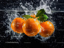 Fresh Oranges Splashing into Water with Vibrant Juicy Colors