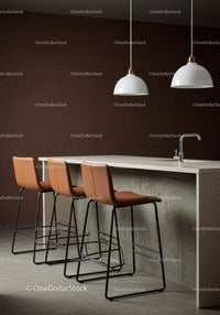 Modern Kitchen Scene with Brown Leather Bar Stools and White Island