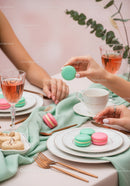 Colorful Macarons and Tea on Elegant Pastel Table Setting