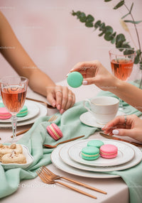 Colorful Macarons and Tea on Elegant Pastel Table Setting