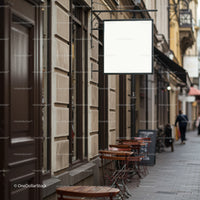 Empty outdoor café with blank hanging sign on city street