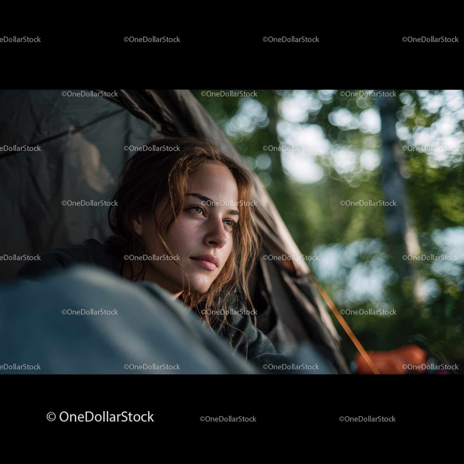 Young Woman Relaxing in Tented Forest Camp Looking Thoughtfully