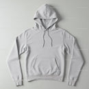 Minimalist White Hoodie Laid Flat on Gray Surface