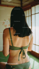 Woman in Green Bikini in Traditional Japanese Room with Sunlight