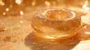 Luxurious Golden Glass Gemstone with Sparkling Glitter in Sunlight