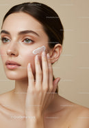 Elegant Woman Applying Skincare Cream for Flawless Skin