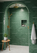 Modern green tiled shower with gold fixtures and wooden stool