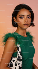 Stylish Woman in Green Dress with Cow-Print Bag and Feathered Details