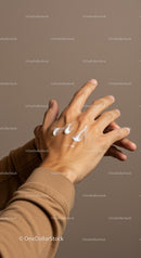Close-Up of Hand Applying Moisturizing Cream for Skin Care