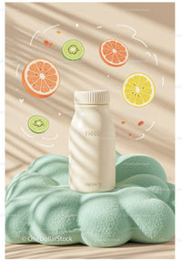 Minimalist white bottle with citrus and kiwi slices
