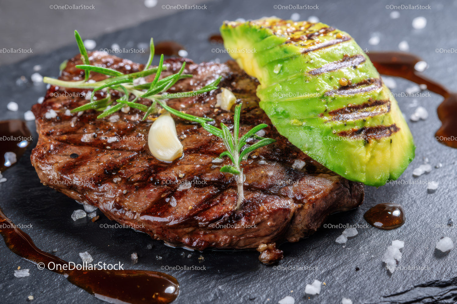 Juicy Grilled Steak with Fresh Avocado and Garnishes