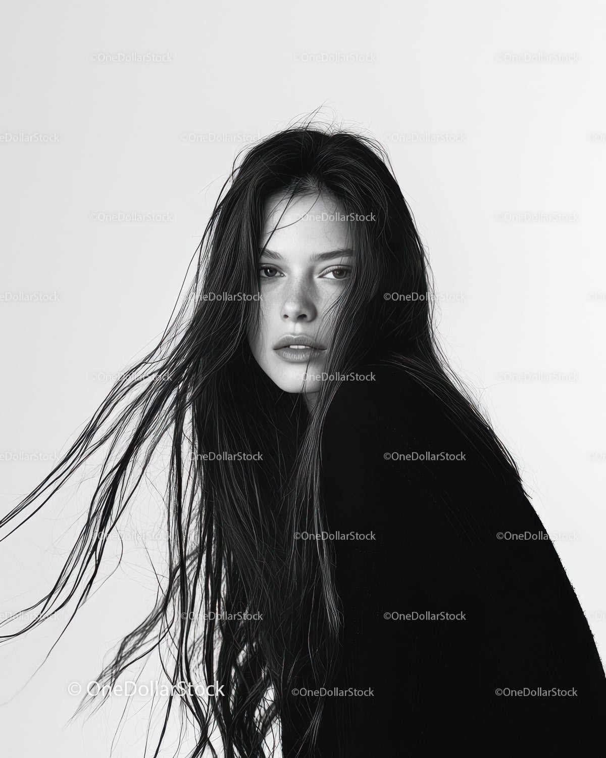 Monochrome Portrait of a Woman with Wet Hair and Intense Expression